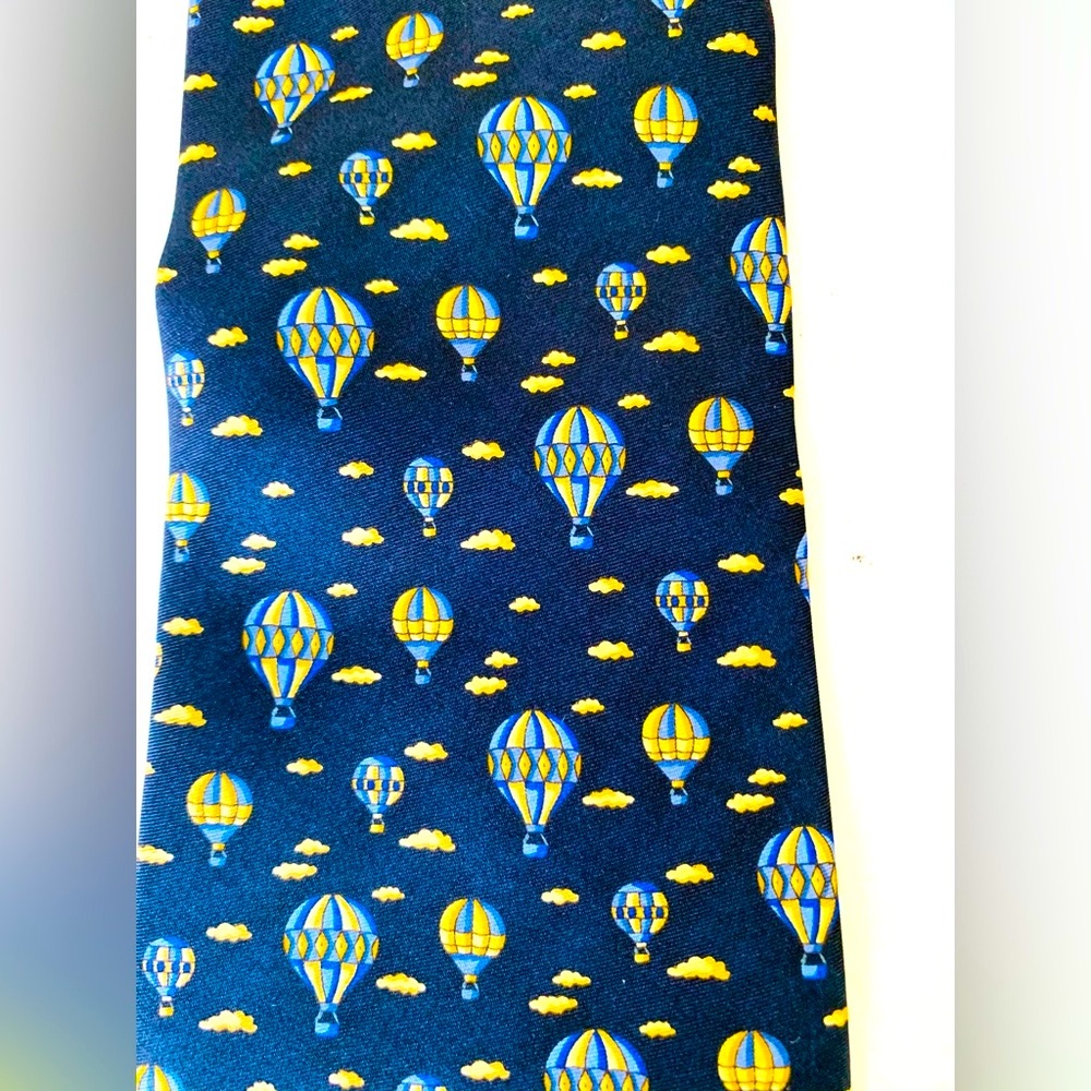 Men’s 100% silk navy blue neck tie with pattern of yellow & blue hot air balloon